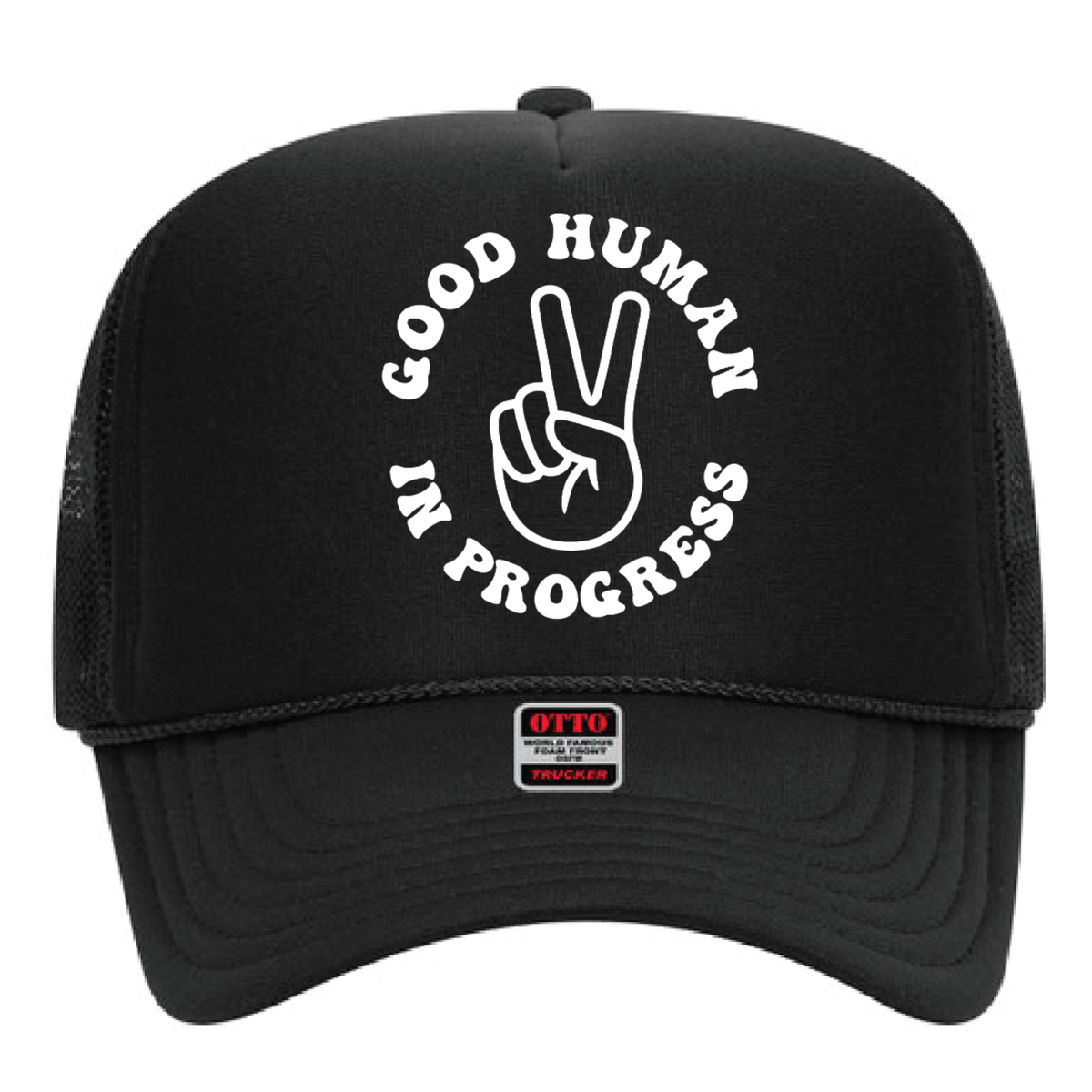 Black youth trucker hat with a white peace-sign hand and “Good Human in Progress” lettering.