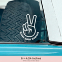Peace-sign decal with brand-pink caption bar