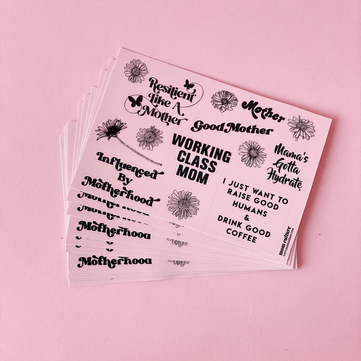 Mom Culture sticker sheets with motherhood slogans and flower illustrations on a pink background.