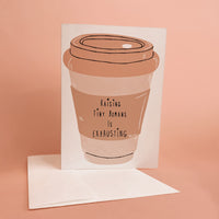 Greeting card illustrated with a takeaway coffee cup reading “Raising Tiny Humans Is Exhausting,” with a white envelope.